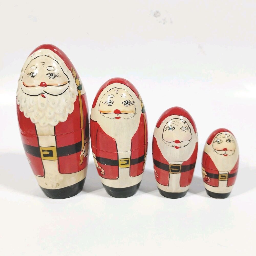 Vtg Christmas Wood Santa Claus Nesting Doll Set of 4 Matryoshka Dolls
